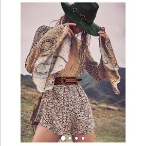 Free people romper with bell sleeves size XS